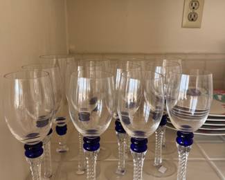 Glassware including wine glasses 
