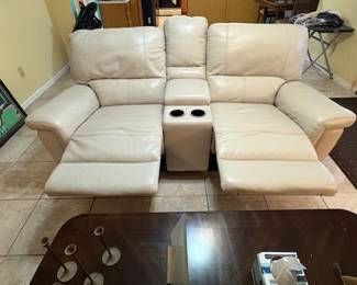 Leather Reclining Loveseat.