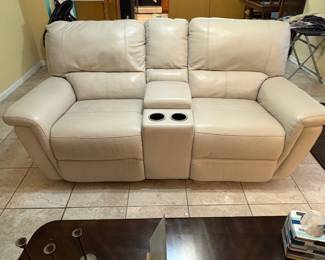 Leather Reclining Loveseat.