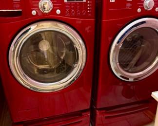 LG Tromm Washer and Electric Dryer with Drawer Pedestal.