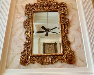 Monumental Rococo Revival giltwood mirror (87” H x 84” W)