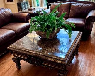 Old world style marble top coffee table