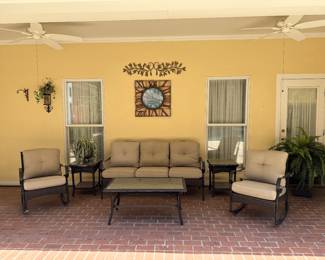 Outdoor sofa, pair of rockers, pair of end tables and coffee table