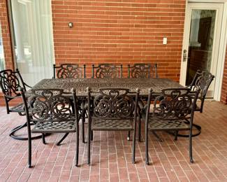 Patio dining table and 8 chairs