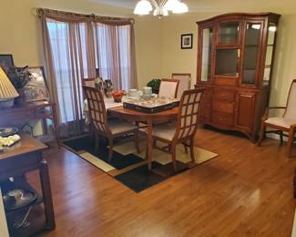 Beautiful Dining room set, China cabinet, Table with (2) Captains chairs, (4) side chairs all in mint condition!