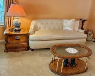 Two matching couches owner paid $5000.
