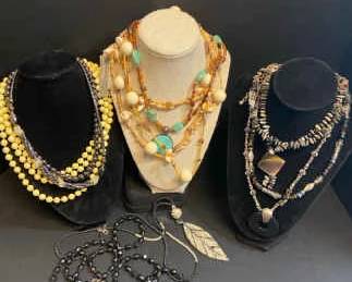 Assortment Of Necklaces Both Beaded Shells In Blacks Browns