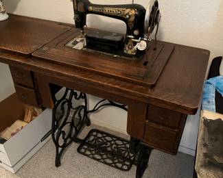 Antique Franklin treadle sewing machine and cabinet