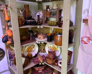 kitchen shelves are full in the Attic at Red Queen's