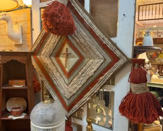 1970s Boho eye of God Pom Pom wall art made with wool and yarn