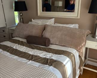 Queen bed and wood mirror