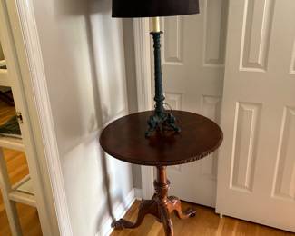 Table with inlay decoration and lamp