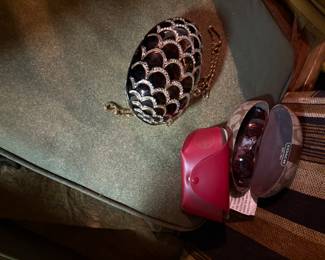 Sun glasses and metal purse