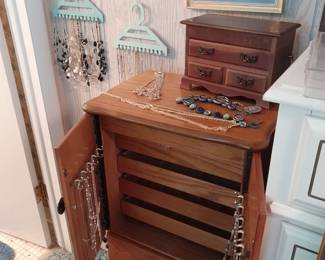 Jewlery and jewelry cabinet. Several jewelry boxes