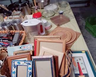 GARAGE HAS LOTS OF KITCHEN, BASKETS, A RT, REUSABLE BINS, COOKBOOKS, CERAMIC PICTURE FRAMES, LADIES BIKE, LADDER,
