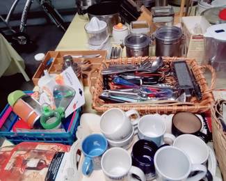 GARAGE HAS LOTS OF KITCHEN, BASKETS, A RT, REUSABLE BINS, COOKBOOKS, CERAMIC PICTURE FRAMES, LADIES BIKE, LADDER,