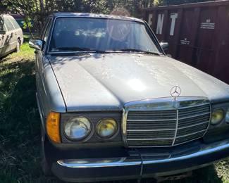 1). 1983 Mercedes 300 with 240,248 miles,
