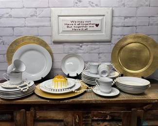 Number piece fine china set with gold embellishment and chargers