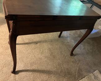 Solid Wood Extendable Wooden Table - fits perfectly up against a wall. Opens up and extends to seat four.