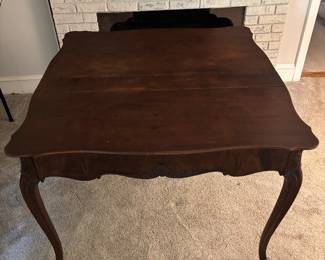 Solid Wood Extendable Wooden Table - fits perfectly up against a wall. Opens up and extends to seat four.