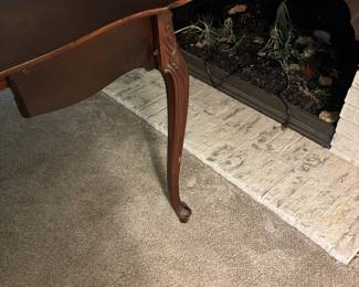 Solid Wood Extendable Wooden Table - fits perfectly up against a wall. Opens up and extends to seat four.
