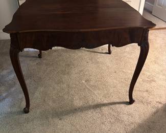 Solid Wood Extendable Wooden Table - fits perfectly up against a wall. Opens up and extends to seat four.