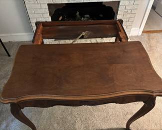Solid Wood Extendable Wooden Table - fits perfectly up against a wall. Opens up and extends to seat four.