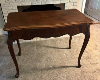 Solid Wood Extendable Wooden Table - fits perfectly up against a wall. Opens up and extends to seat four.