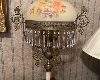 Antique oil lamps galore