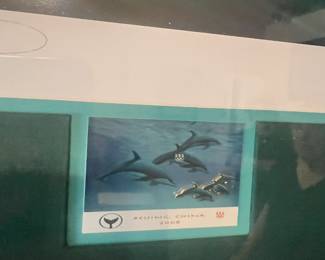 Part of the Wyland Olympics Dolphins signed 