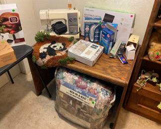 Oak desk,sewing machine, bed in a bag