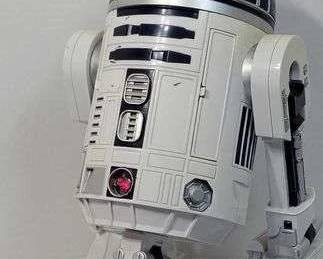 1 R2D2 Hasboro 2002. Some lights flash, whistles and beeps, the head turns back and forth and it mak