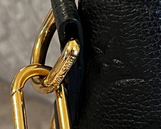 Louis Vuitton
Melie Handbag Monogram Empreinte Leather- Like NEW! Only carried once.