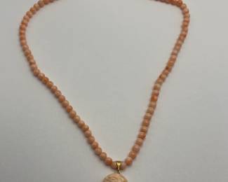 14Kt Gold and Carved Coral Cameo Necklace