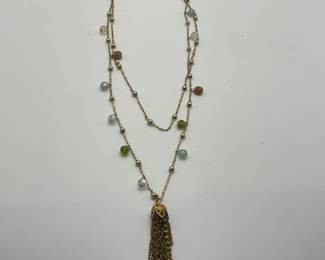 Nice long tiered necklace.