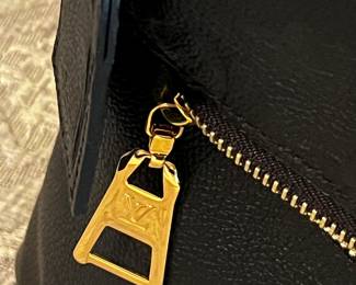 Louis Vuitton
Melie Handbag Monogram Empreinte Leather- Like NEW! Only carried once.