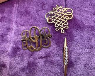 3 Brooches $6.00
