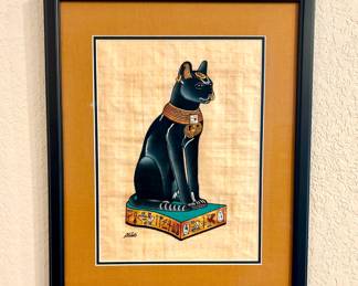 Framed art featuring Bastet, the cat goddess. Signed