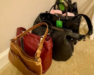 Leather purses, several are Brighton’s