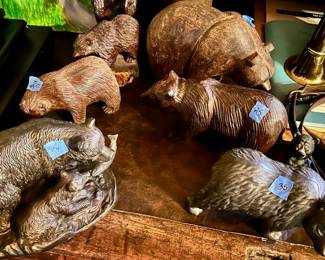 Various metal or wood carved bears
