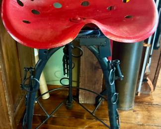 Red Tractor seat stool with black legs $115