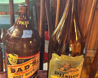 *Antique Dad’s old-fashioned root beer bottle empty, intact label $50
*Gota  Lajon Pilsner style beer, Star Union Products, draft keg beer bottle, Peru. IL $20