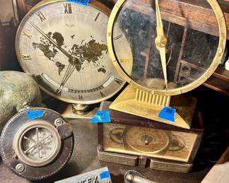 *Kienzle gold round framed clock with gold Roman numerals & map of continents $40 sold
* Round Gold Framed (with Roman numbers on frame) clock w/ glass face gold base $35
*bake-a-lite brown clock, air pressure, humidity $30
*Detex watchclock station 
* Vntg round Leather Bound Detex Watchman  clock $50
