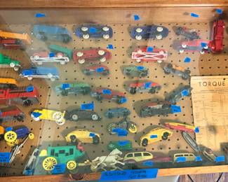 Display case of Antique/ vintage Miniature cars $1-25 ea. complete set with wood/glass front display case $400