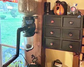 Antiq grinder $89
6 drawer spice / storage cabinet $35
Chicago Cubs glass $5