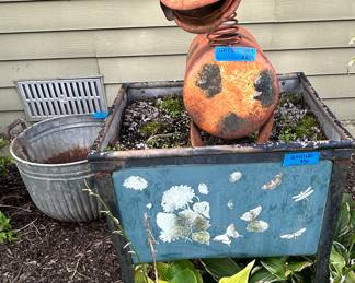 12 x 25 x 20”h metal cow $25
20 x -7 x 27”h blue metal planter $50
Galvanized round bin $25