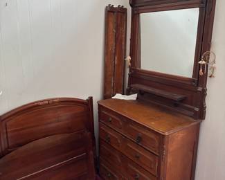 twin beds to left eastlake dresser we found all the handles in bottom drawer, so its all there