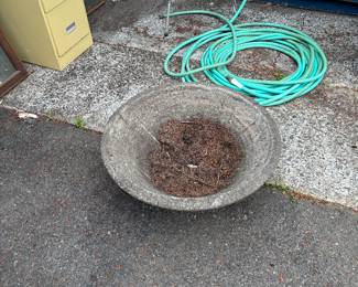 large flower pot or maybe bird bath, bring help if you want this