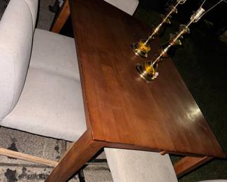 This is a pretty large bar top table. It has a butterfly leaf to expand. Has a few heat stains. Fabric chairs go with, they could be cleaned. $125 for the set.