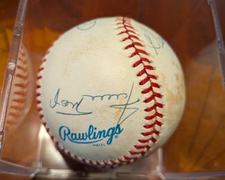 An extraordinary piece of baseball history! This official league baseball is a must-have for a serious collector, featuring the signatures of two Hall of Famers, Mickey Mantle and Whitey Ford, as well as baseball legends Johnny Mize, Bobby Richardson, Tony Kubek, George Foster, and Bobby Brown. This multi-signed ball is a rare and highly desirable collectible, a true centerpiece for any sports memorabilia collection.
